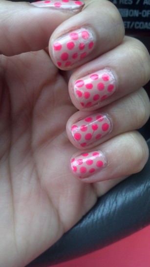 nude and neon pink polka dots mani